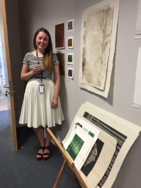 Ane Smith with her display of prints